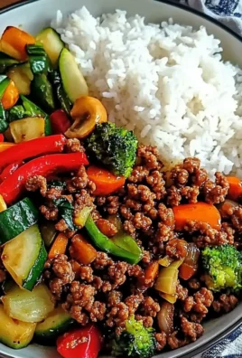 Spicy Ground Beef Stir Fry Bowl with Garlic Veggies & Steamy Rice