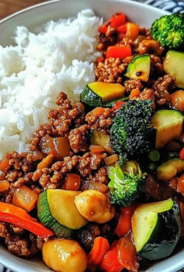 Spicy Ground Beef Stir Fry Bowl with Garlic Veggies & Steamy Rice