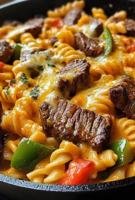 Cheesy Spicy Cajun Steak & Pasta Skillet