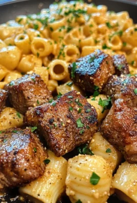 Cajun Steak Bites with Cheesy Garlic Shell Pasta Skillet