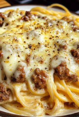 Cheesy Cajun Ground Beef Linguine in Garlic Cream Sauce