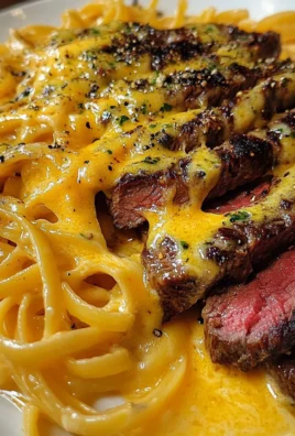 Garlic Butter Steak Strips with Creamy Spicy Cheddar Linguine