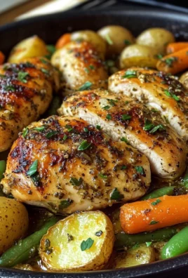 One-Pan Garlic Herb Chicken with Roasted Potatoes, Carrots & Green Beans