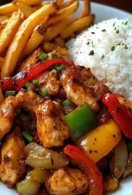 Spicy Chicken Stir-Fry with Rice & Crispy Fries